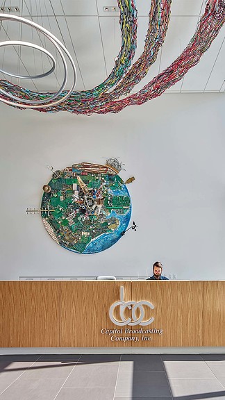 A person standing behind a podium.
